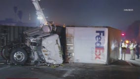 FedEx truck overturns on 60 Freeway