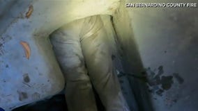 Woman pulled out of drainage tunnel