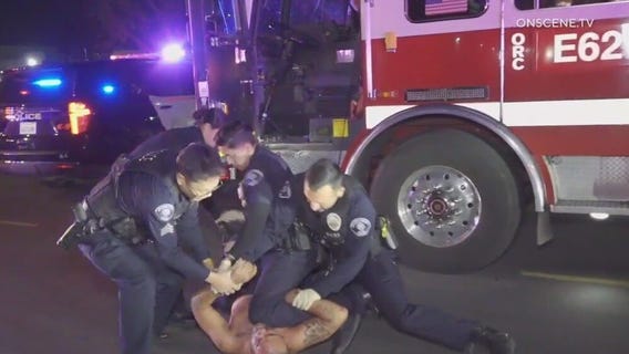 Man attacks firefighters, locks himself in firetruck
