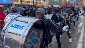 Honolulu Boom performs outside of Ford Field as fans enter for Divisional playoff game