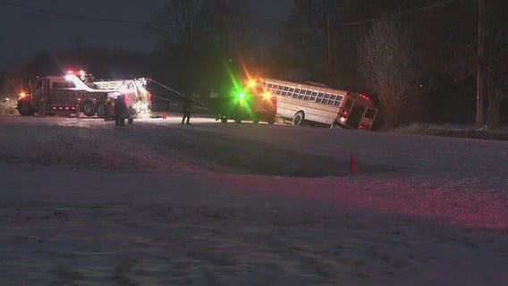 Michigan school bus carrying kids slides into ditch