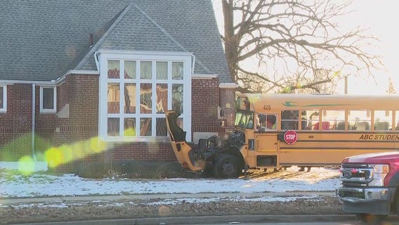 School bus collides with driver who ran red light in Detroit