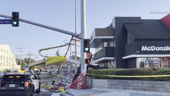 McDonald's sign falls on biker on PCH