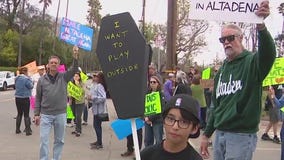 Altadena residents protest wildfire debris site