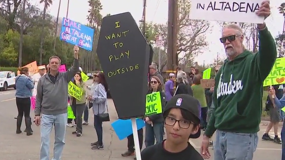 Altadena residents protest wildfire debris site
