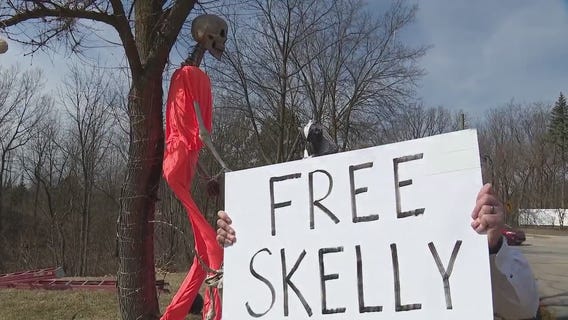 Van Buren Township neighbors work to save giant 'Skelly' display