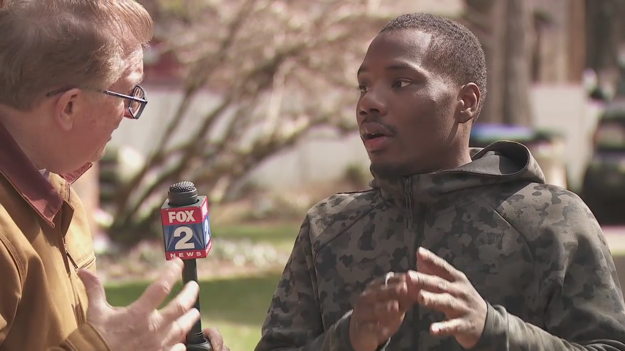 Hero saves woman from Detroit house fire