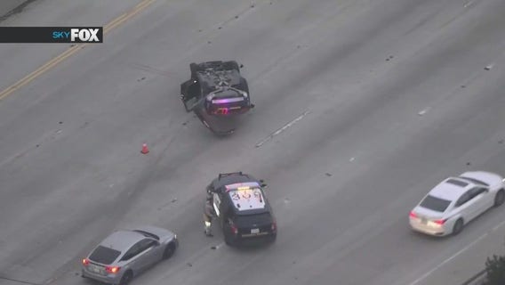 Cop car flips over during police chase