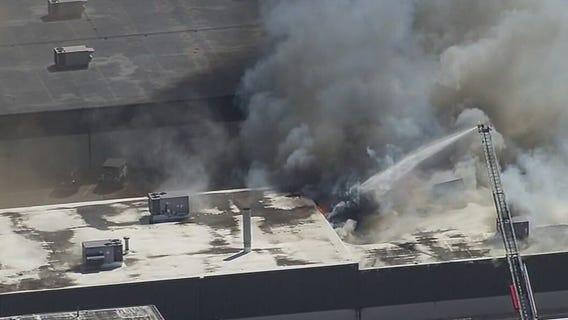 Crews battle building fire in Roseville