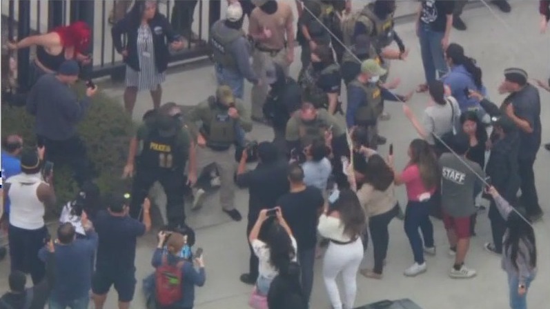 LA immigration raids lead to clashes, arrests