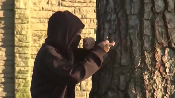 Man throws Molotov cocktail during protest