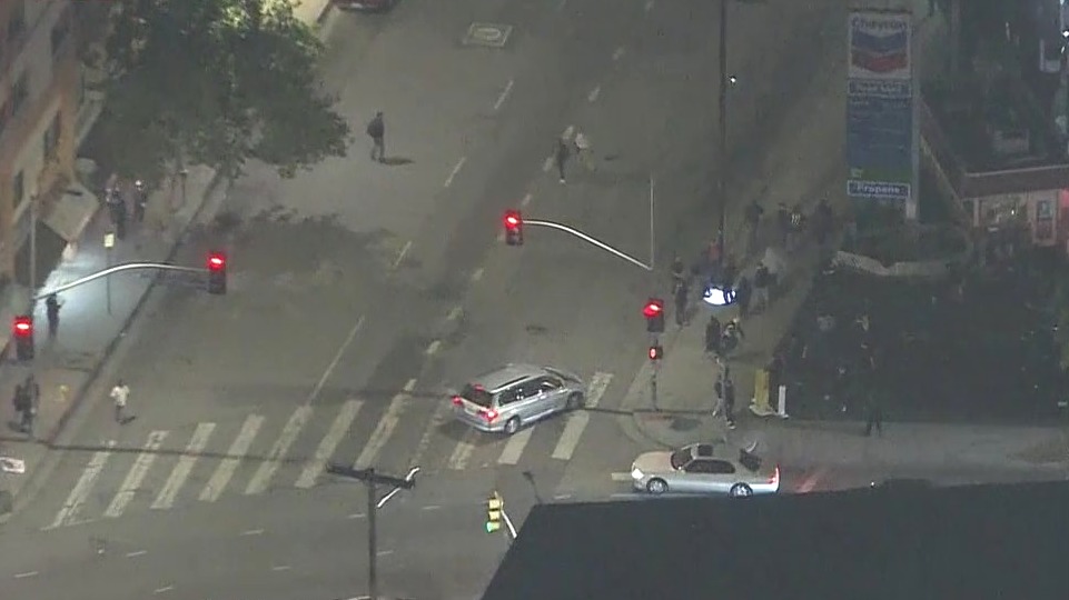 Minivan drives on walkways, sideswiped bikers