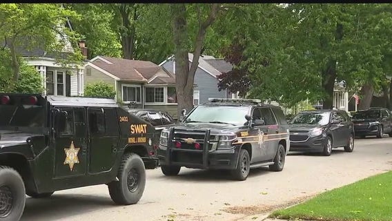 Police surround Royal Oak home Friday morning