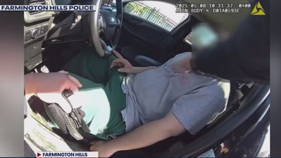 Police video shows officers save passed out driver with Narcan in Farmington Hills