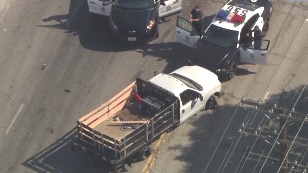 Wobbly truck leads half-hour LA police chase