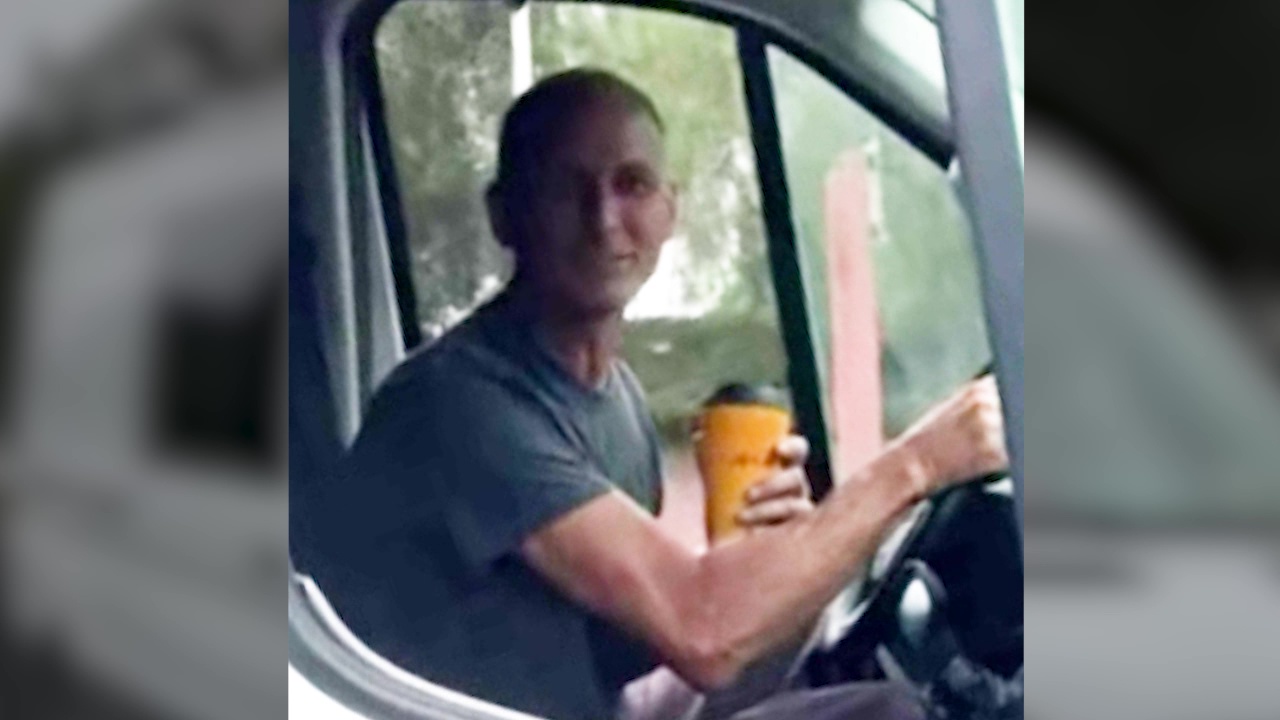 Man shouts racial slurs, throws coffee at driver
