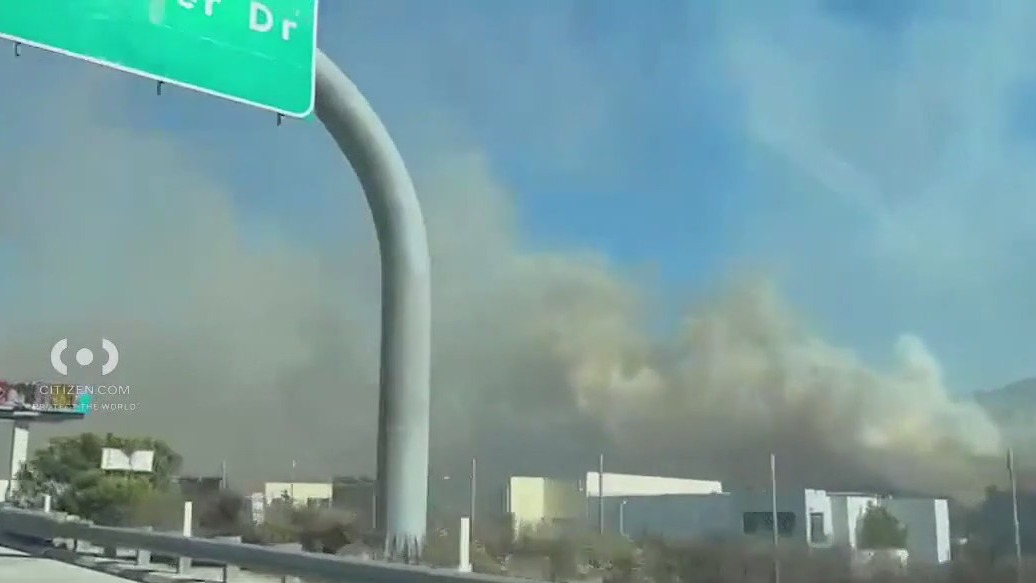 Corona brush fire prompts evacuations