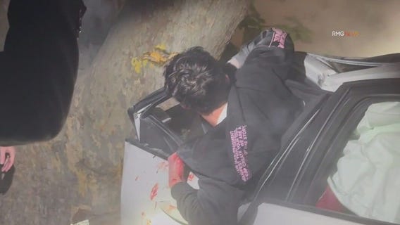 Driver rescued by hero bystander from fiery crash