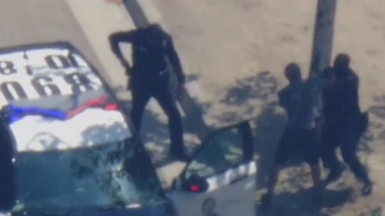 Pursuit suspect throws punch at LAPD officer