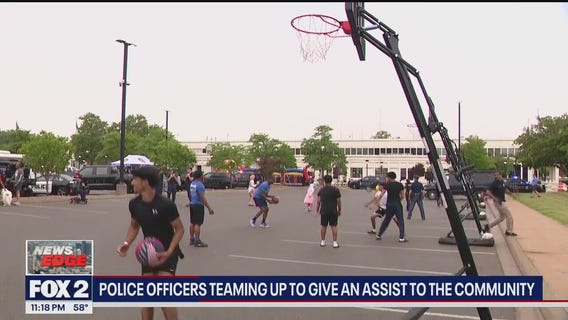 Michigan police officers team up to give an assist to the community