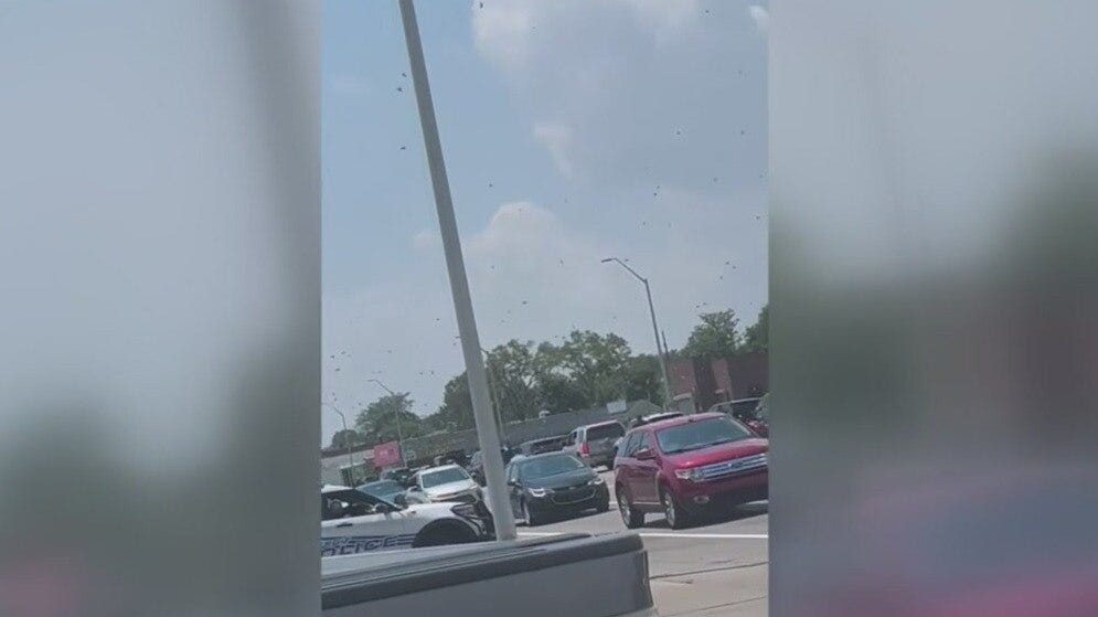 Helicopter drops cash on Gratiot Avenue