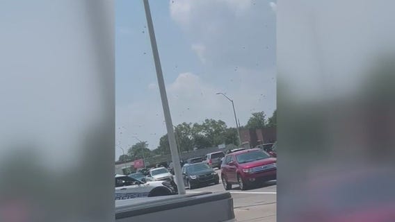 Helicopter drops cash on Gratiot Avenue