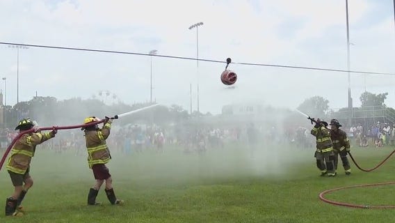 Troy and Clawson firefighters battle for the bucket
