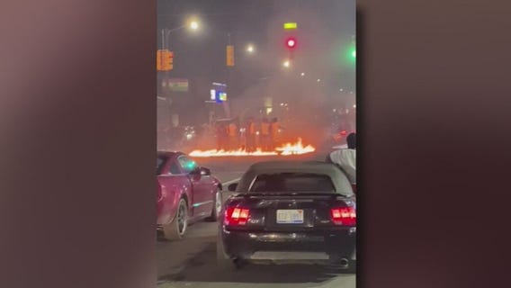 Detroit street takeover ends with car set on fire