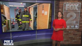 Macomb Township Firefighters trade fire hoses for yoga poses