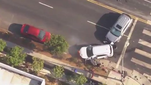 Bystanders witness pursuit crash in Harvard Heights | FOX 11 Los Angeles