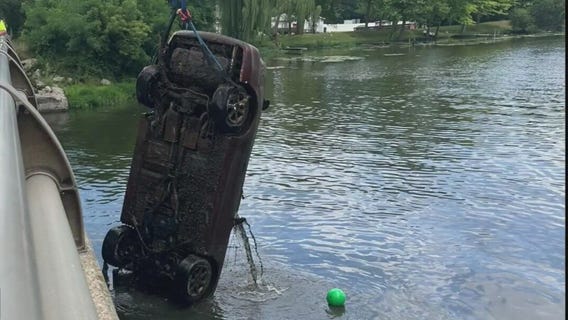 Police search for clues after Mustang is pulled from lake