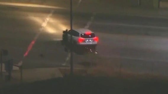 Police chase ends in car going off road, crashing