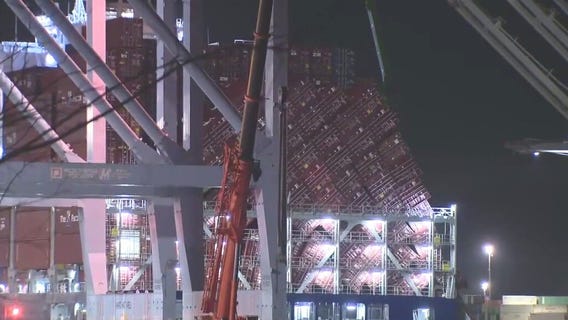 Salvage efforts underway after container spill