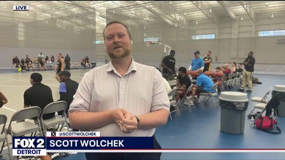 Oakland County Sheriff's Police Athletic League takes on kids in charity basketball game