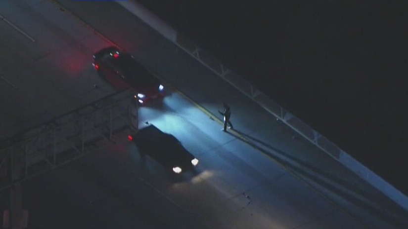 Pursuit suspect runs across 101 Freeway