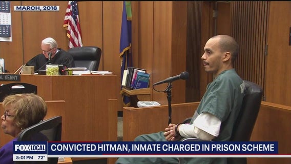 Notorious hit man among 2 charged for crimes behind bars