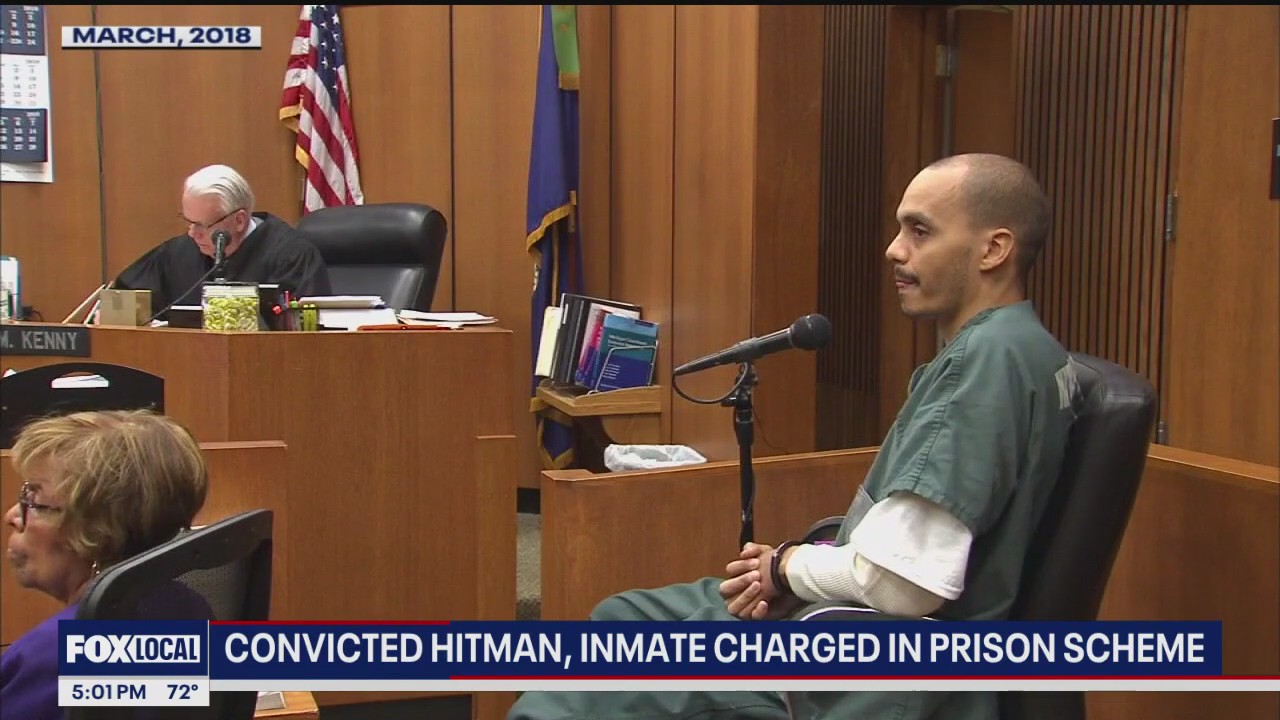 Notorious hit man among 2 charged for crimes behind bars