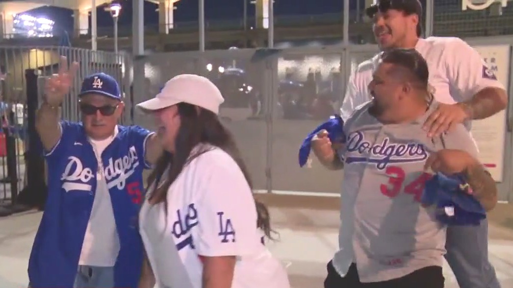 Dodger fans celebrate after wild card sweep