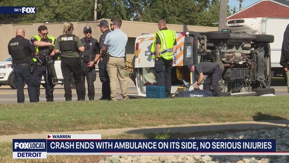 Ambulance flips in crash at Warren intersection with SUV