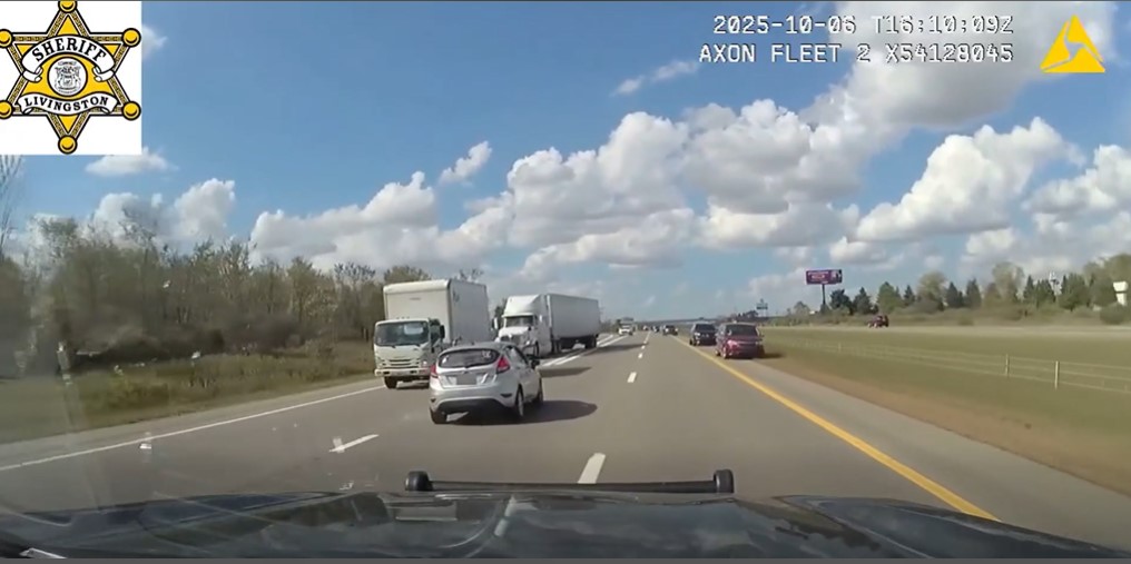 Armed domestic violence suspect police chase on I-96