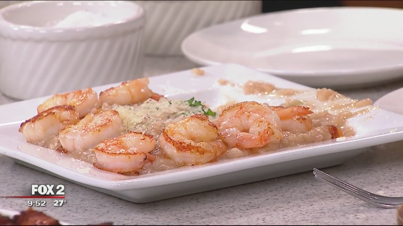 Chef Jeff from C.A.Y.A. Smokehouse Grill prepares shrimp and risotto