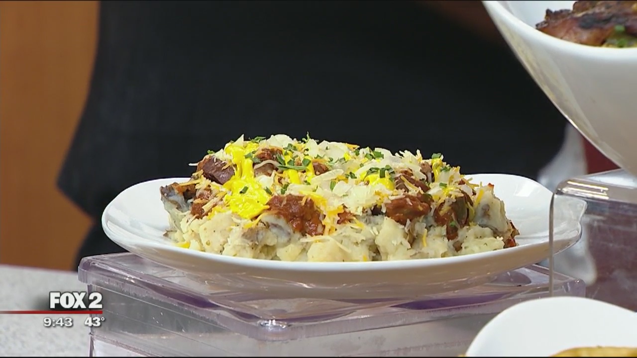 Spud Headz prepares beer cheese bratwurst loaded potatoes