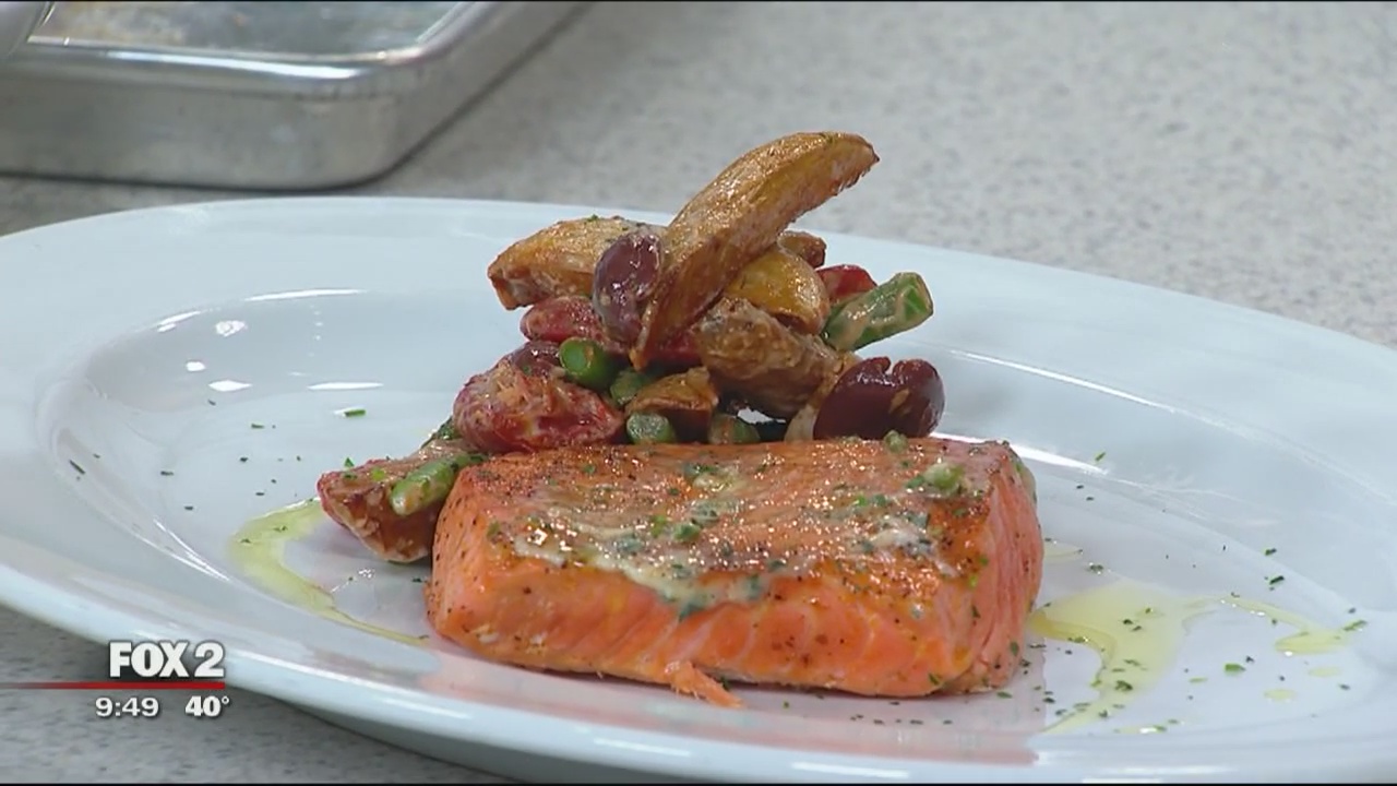 Ocean Prime chef prepares king salmon, halibut dish