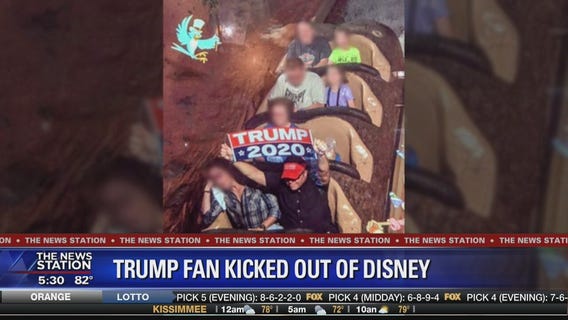 Man banned from Disney after waving Trump banner