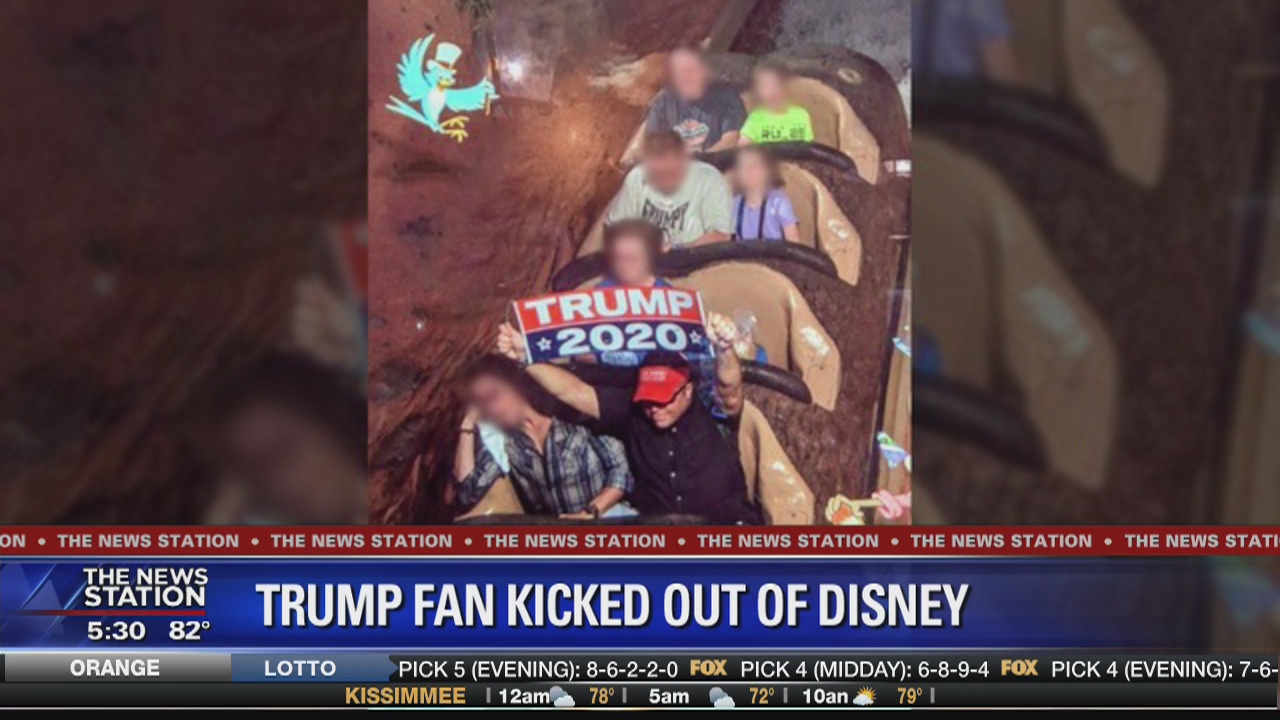 Man banned from Disney after waving Trump banner