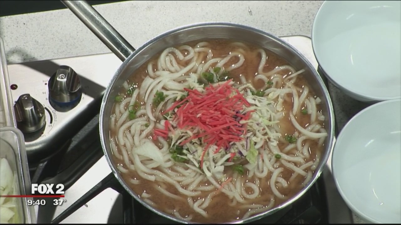 Yuzi Sushi Co. prepares udon noodles, poke bowl
