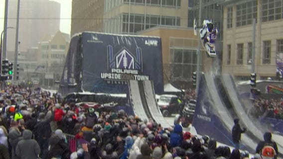 Snowmobile stunt show at Super Bowl LIVE