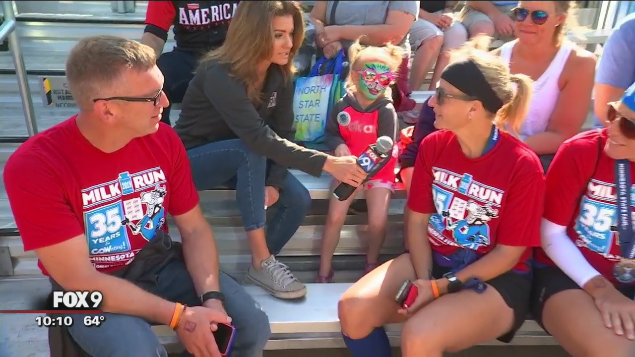 Milk Run participants stop by FOX 9 booth at State Fair