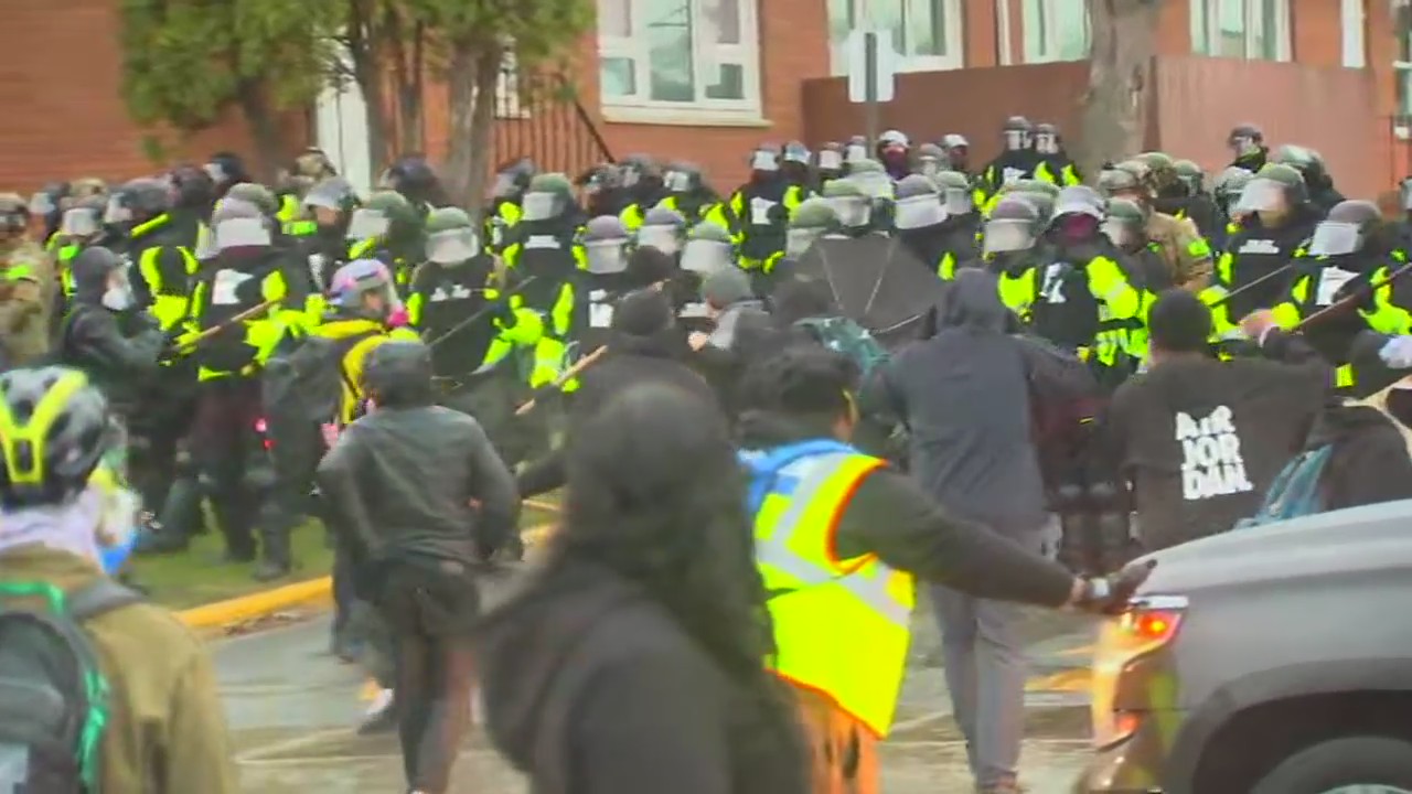 Police deploy pepper spray in confrontation with demonstrators outside Brooklyn Center Police Department