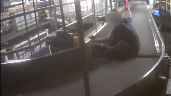 Surveillance video shows boy's wild ride on MSP Airport baggage belt